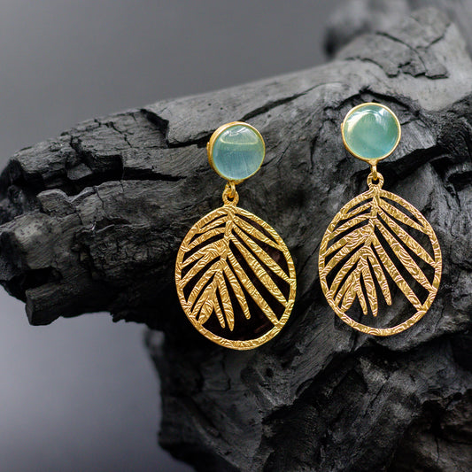 DIVAMAS gold leaf dangle earrings with aqua blue Monalisa stone stud – elegant and nature-inspired design._04