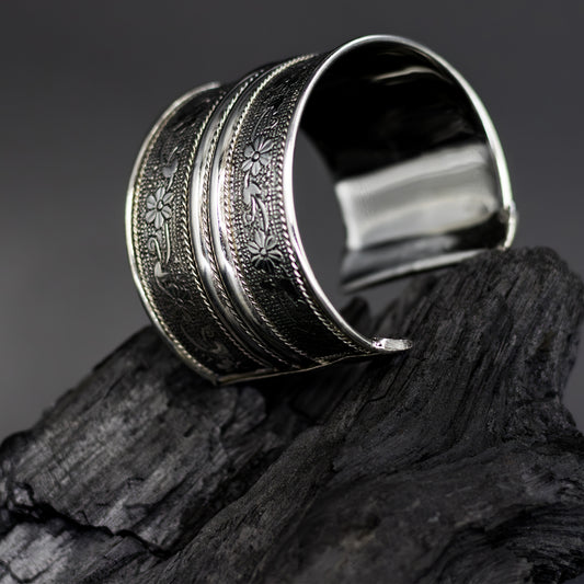 DIVAMAS silver-plated brass floral cuff bangle bracelet with engraved floral detailing, handcrafted statement jewelry for women_01