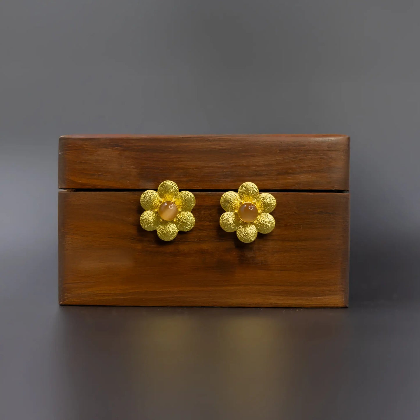 Divamas Elegant Floral Stud Earrings with Textured Gold Finish & Center Gem – Pinkish-Brown