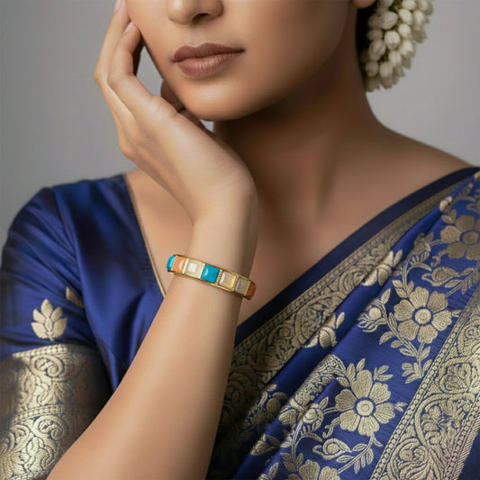 Gold finish bracelet with square stones