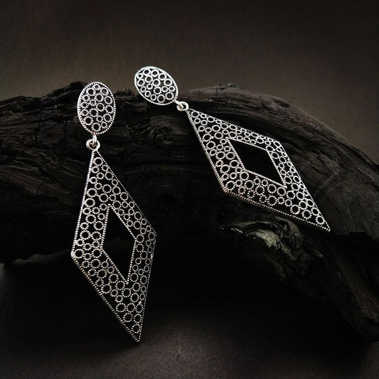 Stylish Silver Alloy Drop Earrings with a sleek and polished silver finish, a lightweight and elegant design, perfect for any occasion.