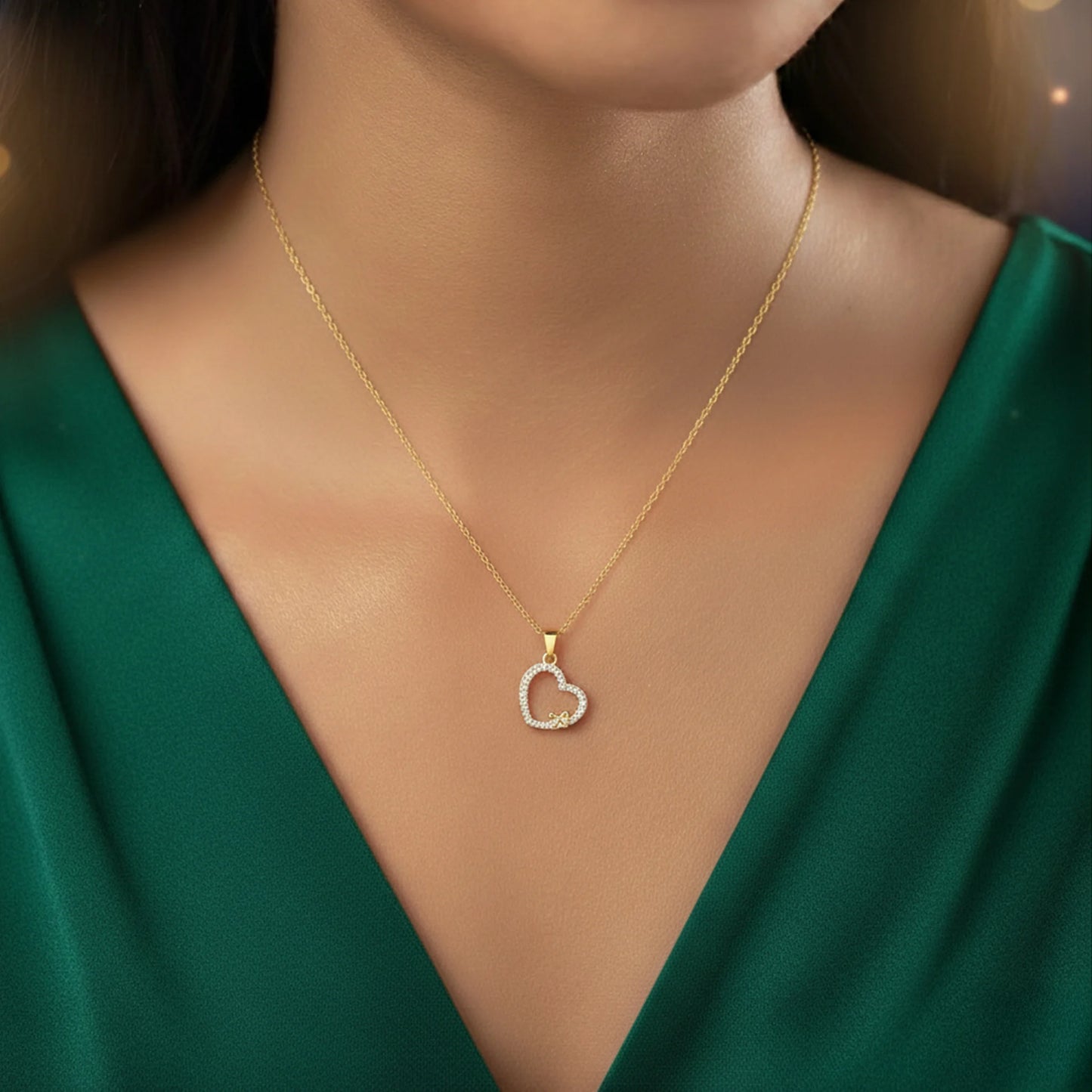 Elegant Gold & Silver Heart Pendant Necklace with Bow Design