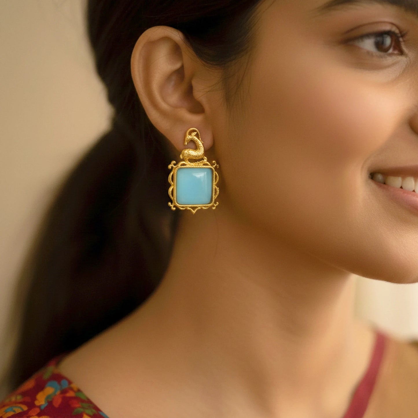 DIVAMAS Antelope Motif Monalisa Stone Earrings – Pink & Blue