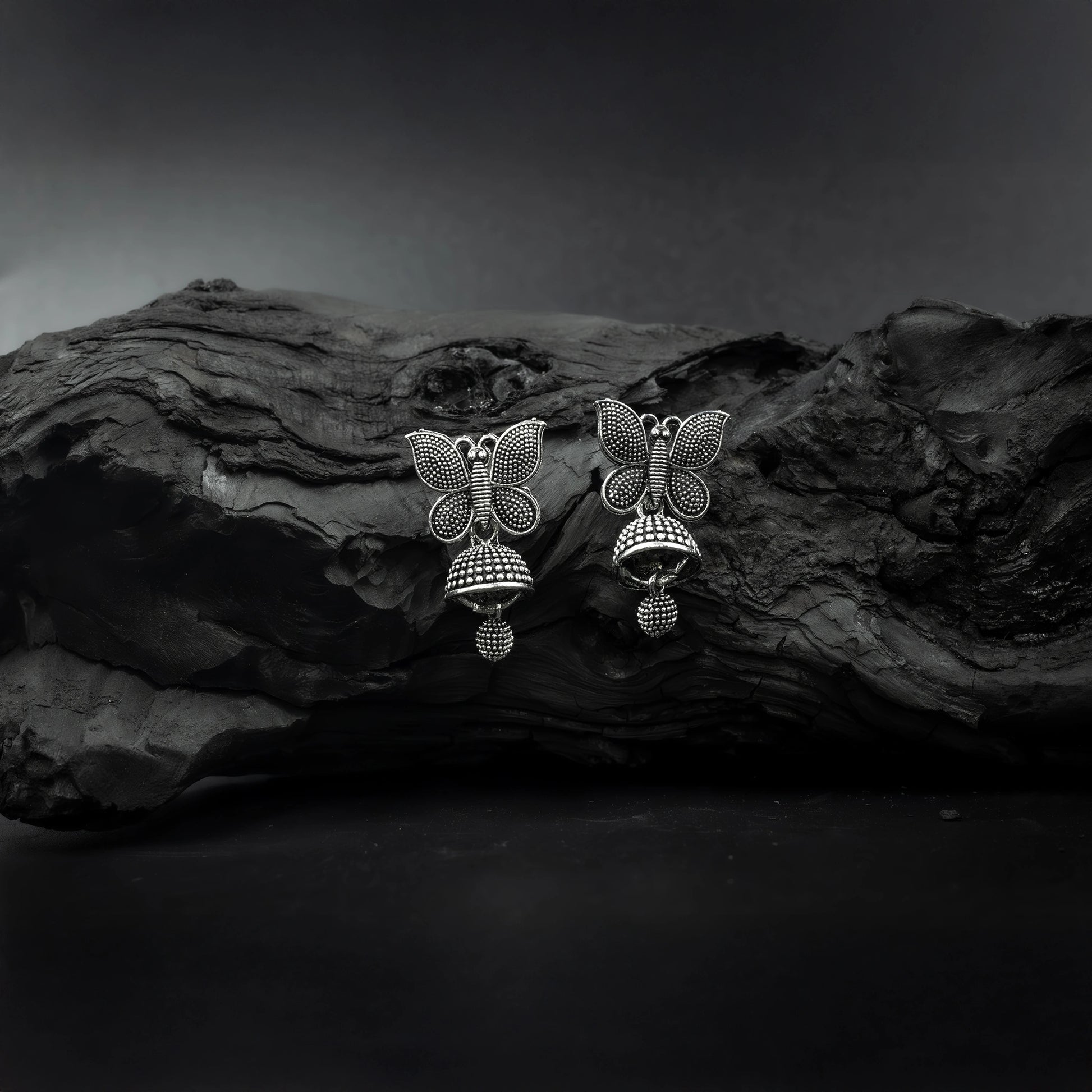 Butterfly design oxidised silver jhumkas