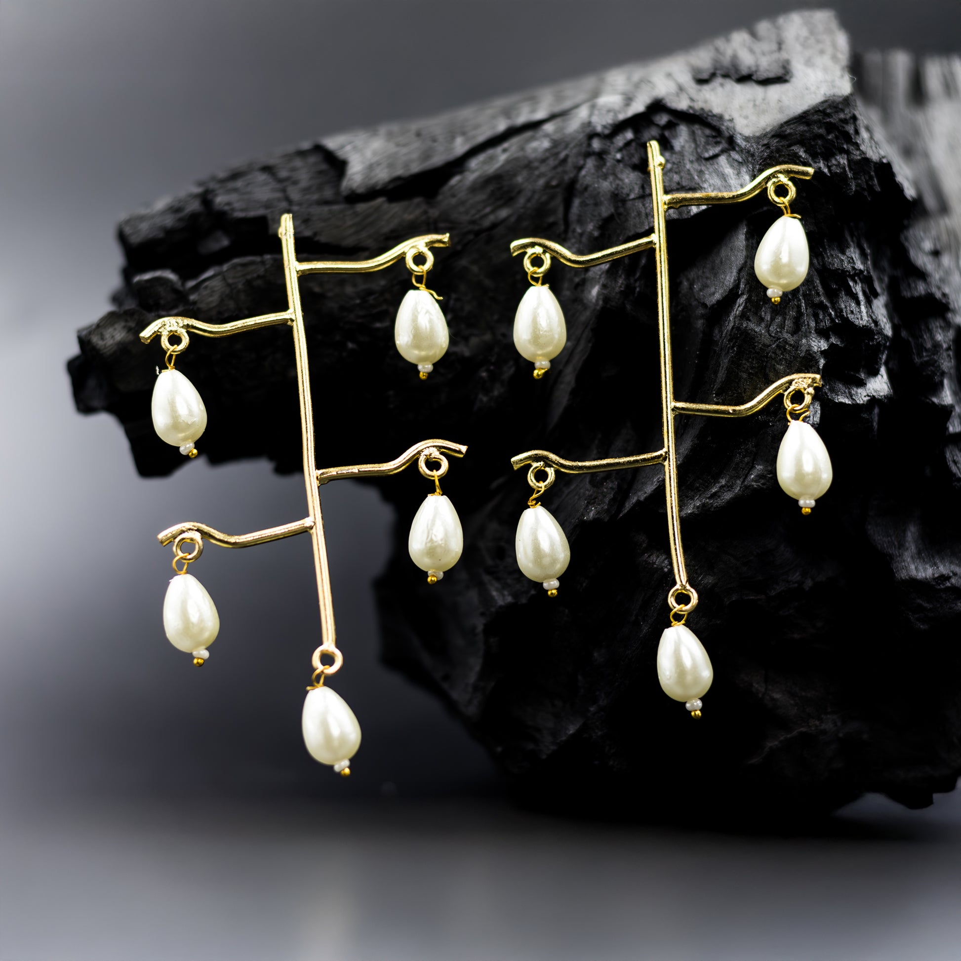 DIVAMAS gold-tone earrings with artistic branch structure and hanging pearl drops – modern ethnic statement jewellery for women_02
