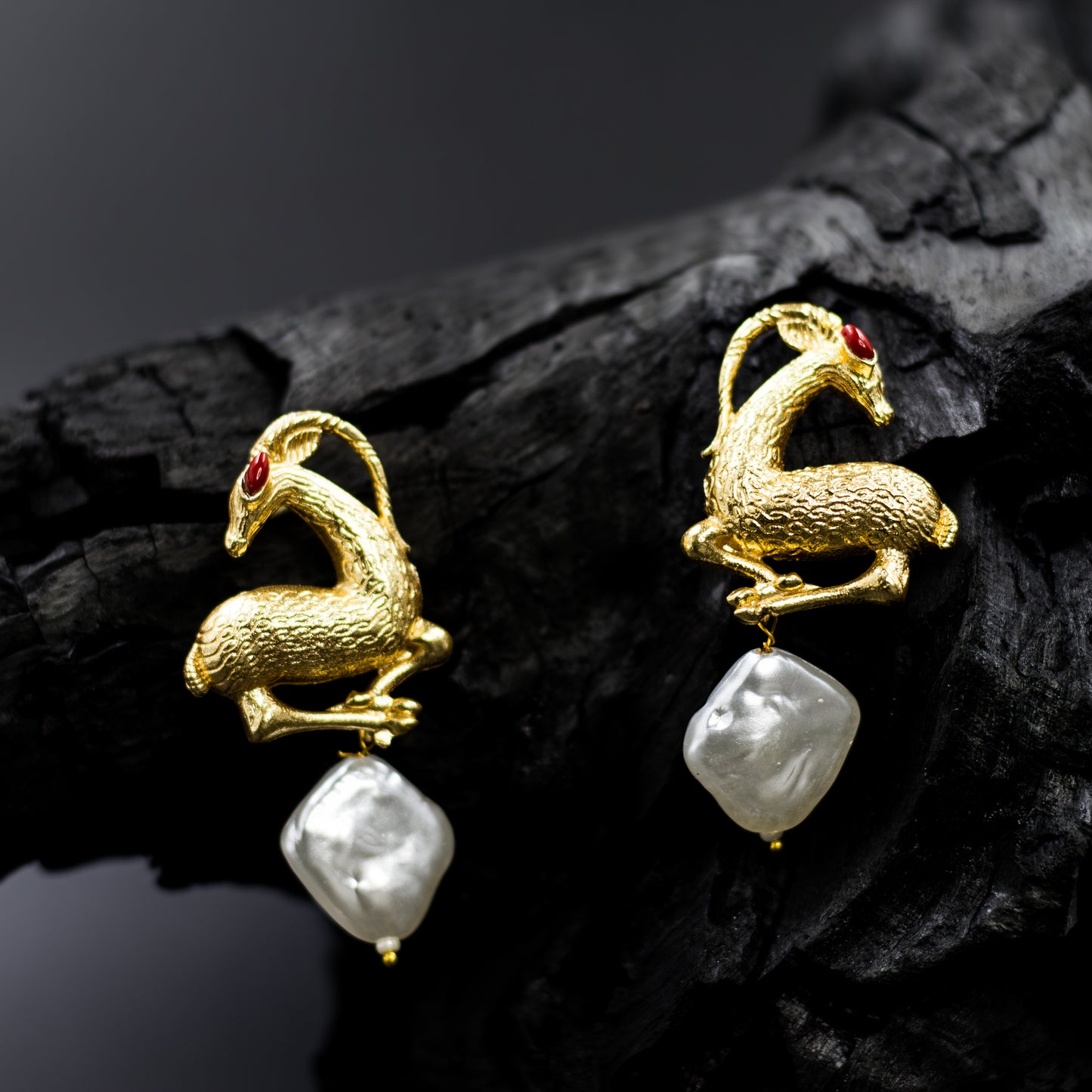 DIVAMAS gold antelope earrings with red eyes and baroque pearl drops – artistic statement jewellery for women_03