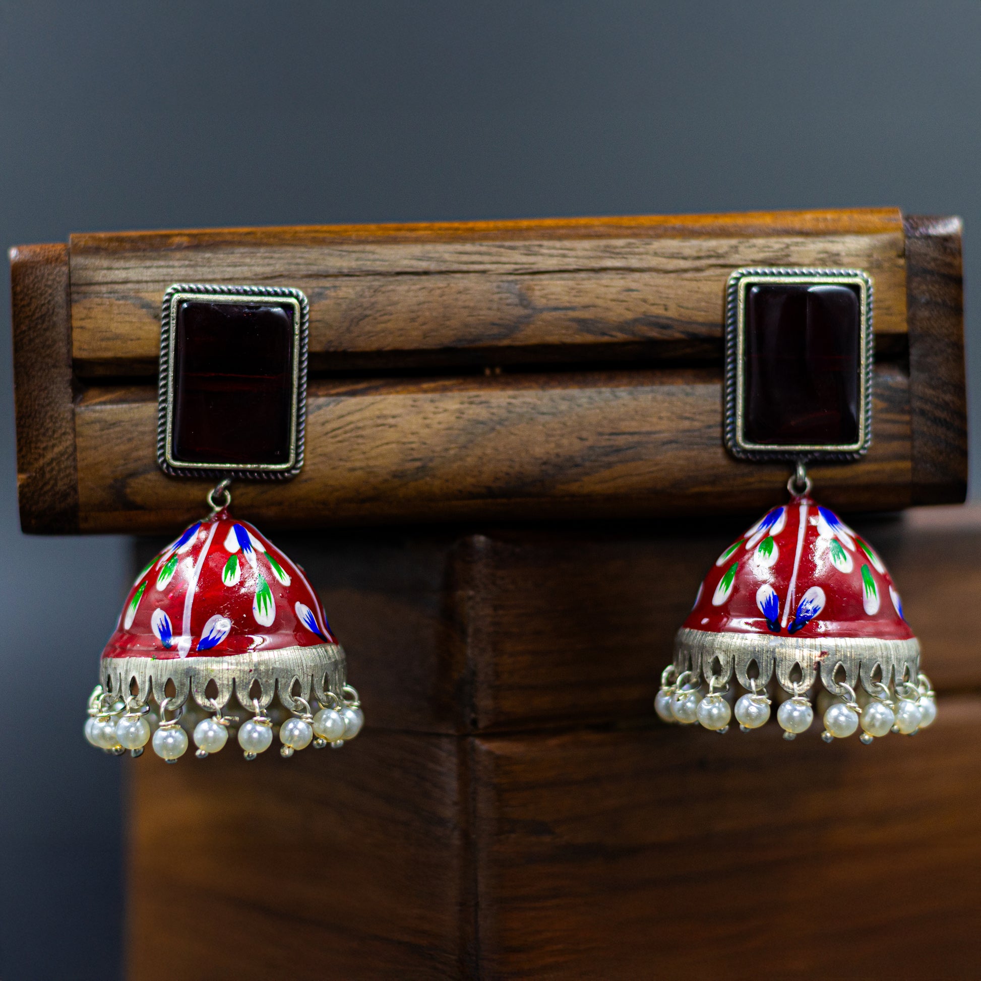DIVAMAS red hand-painted jhumka earrings with antique silver finish and pearl beaded design – perfect traditional earrings for women_01

