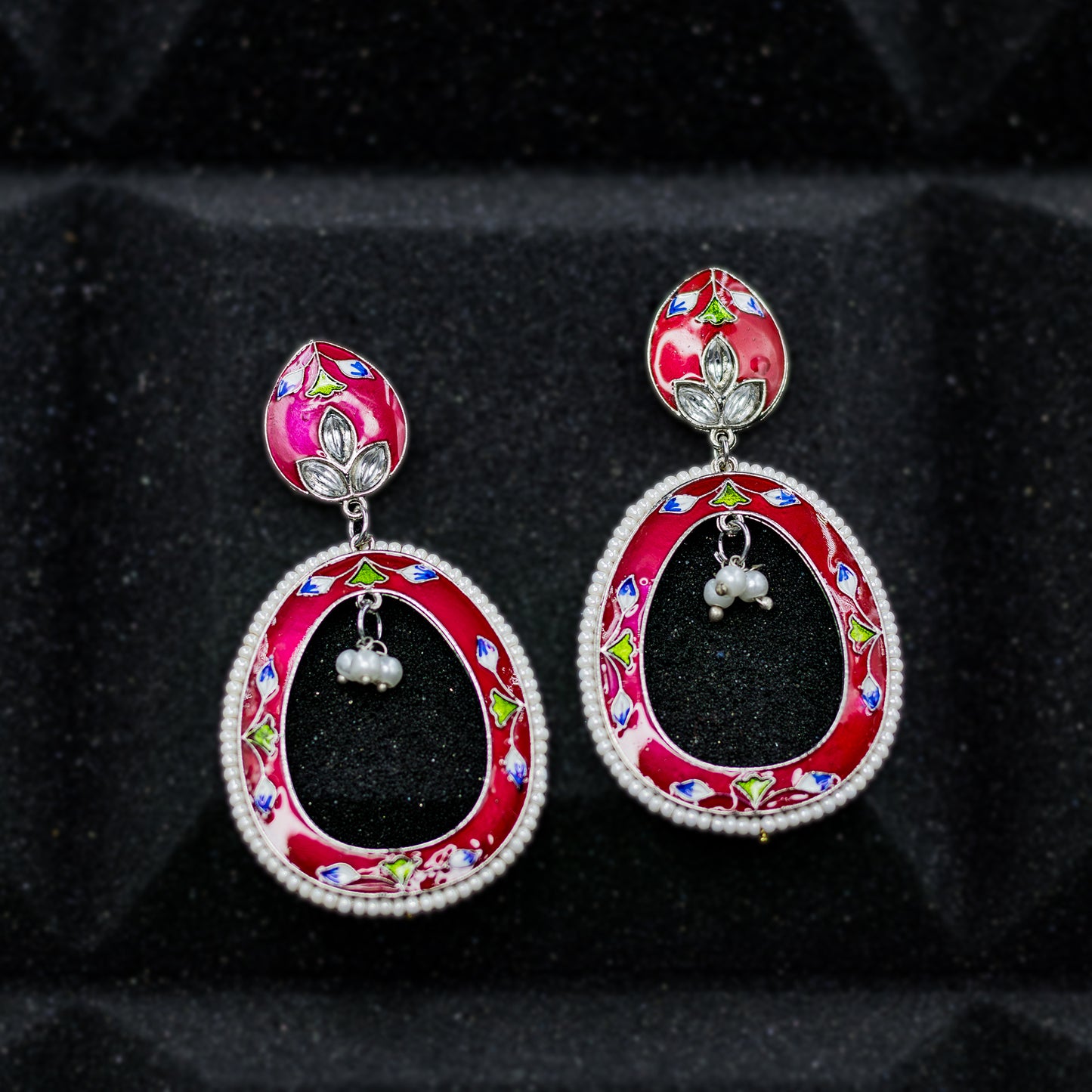 DIVAMAS red Meenakari oval drop earrings with hand-painted floral design, silver plating, and pearl bead_1