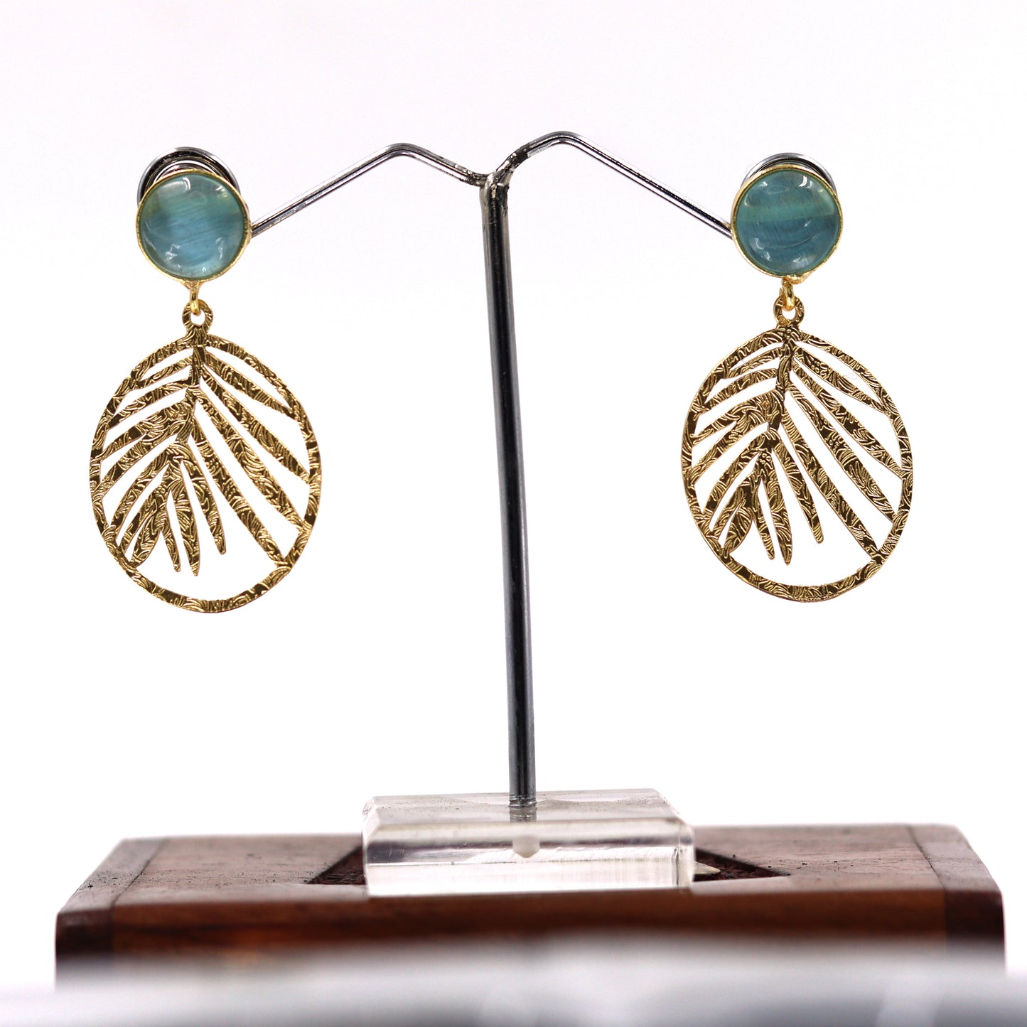 DIVAMAS gold leaf dangle earrings with aqua blue Monalisa stone stud – elegant and nature-inspired design._02