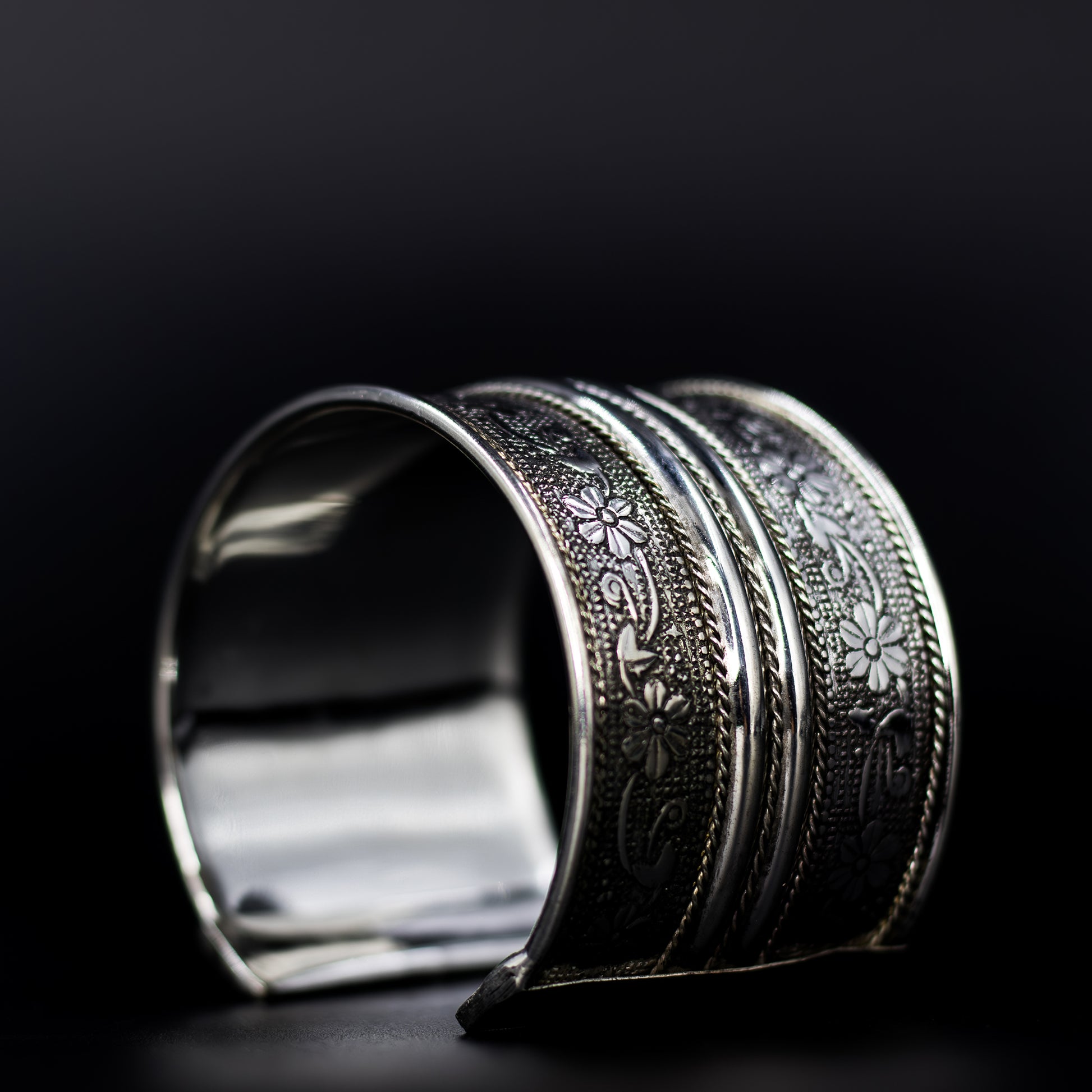 DIVAMAS silver-plated brass floral cuff bangle bracelet with engraved floral detailing, handcrafted statement jewelry for women_02

