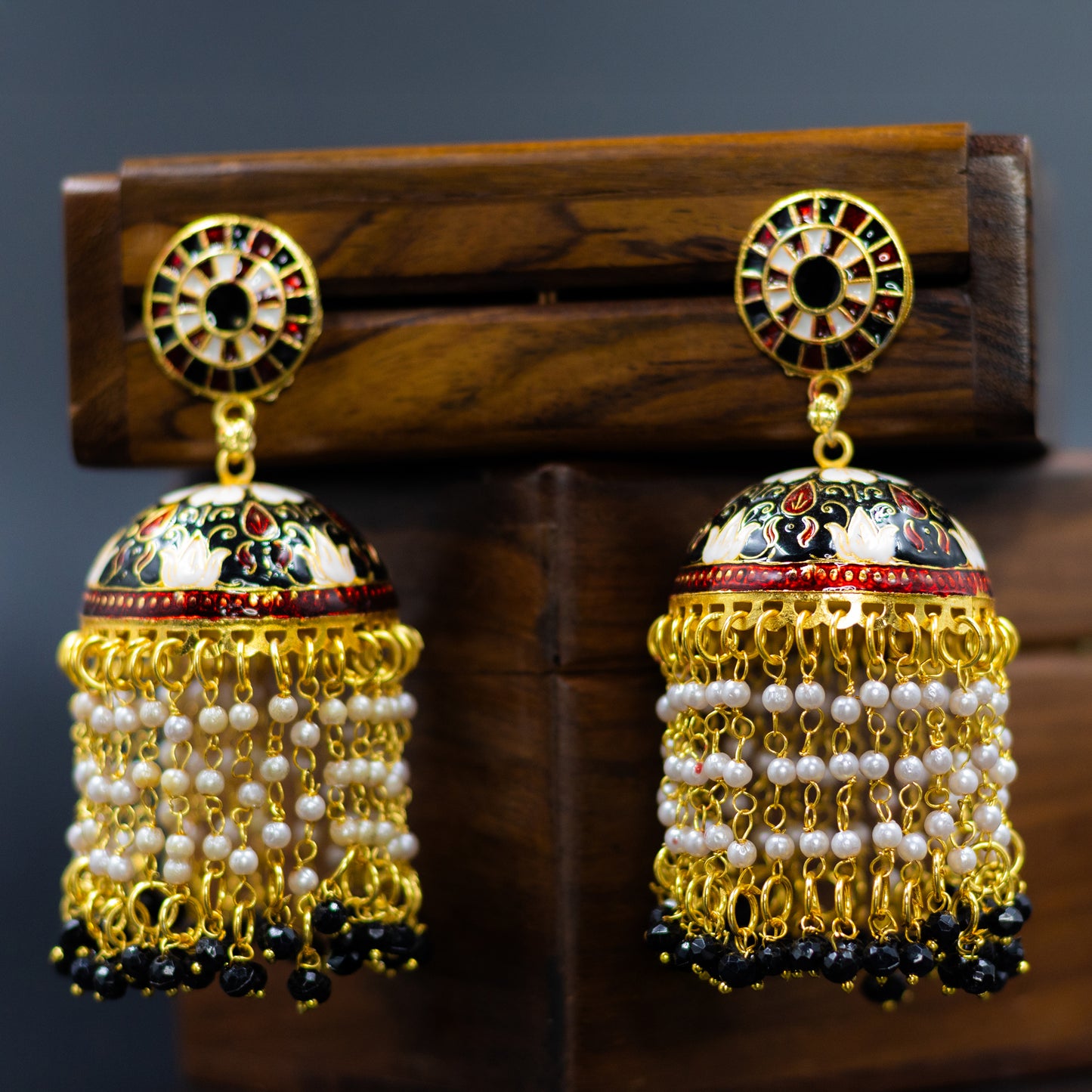 DIVAMAS black-accented Meenakari jhumka earrings with pearl hangings and multicolor detailing – handcrafted Indian ethnic earrings