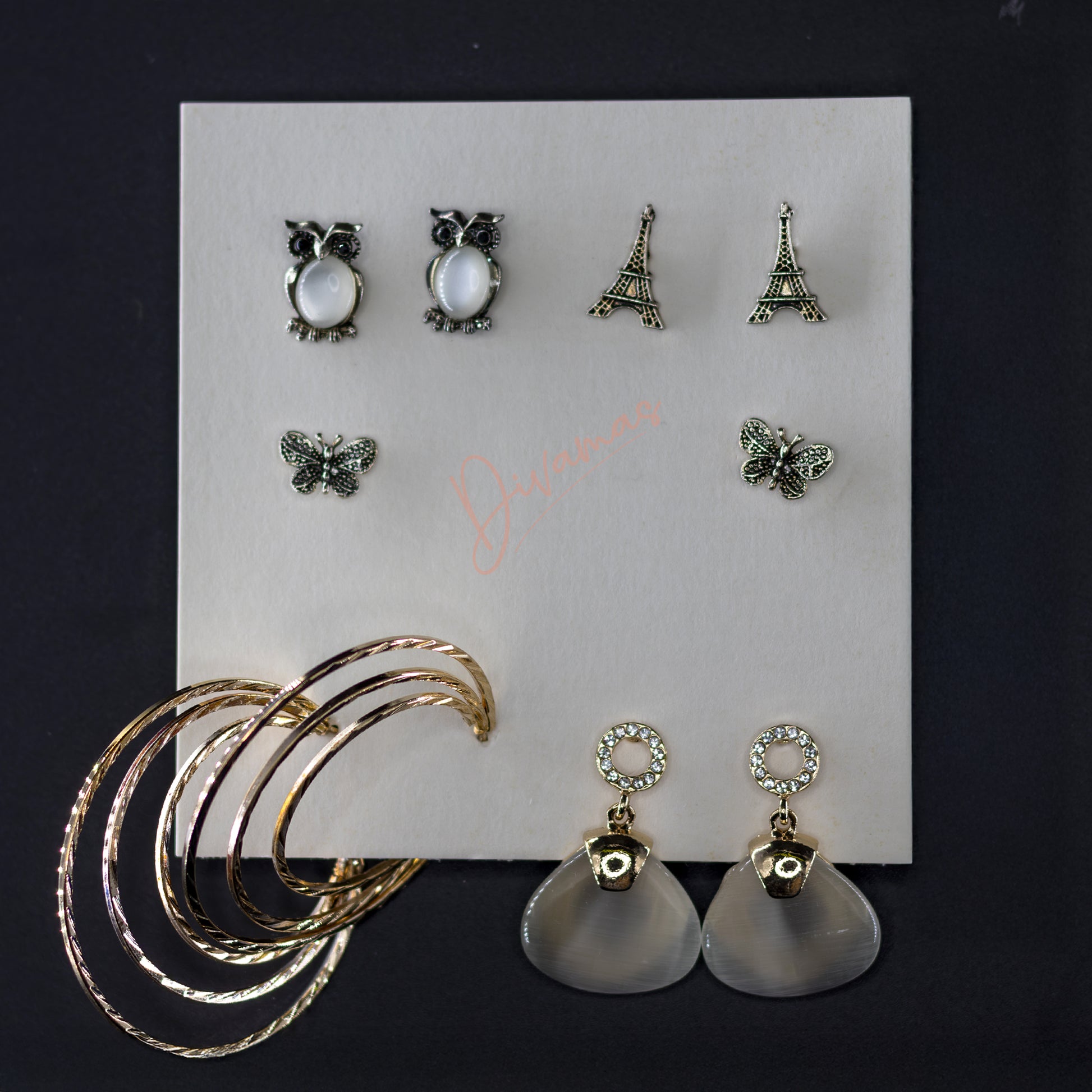 DIVAMAS stylish earring set – 5-in-1 combo of hoops, studs, and danglers. Fashionable, lightweight, and versatile jewelry.