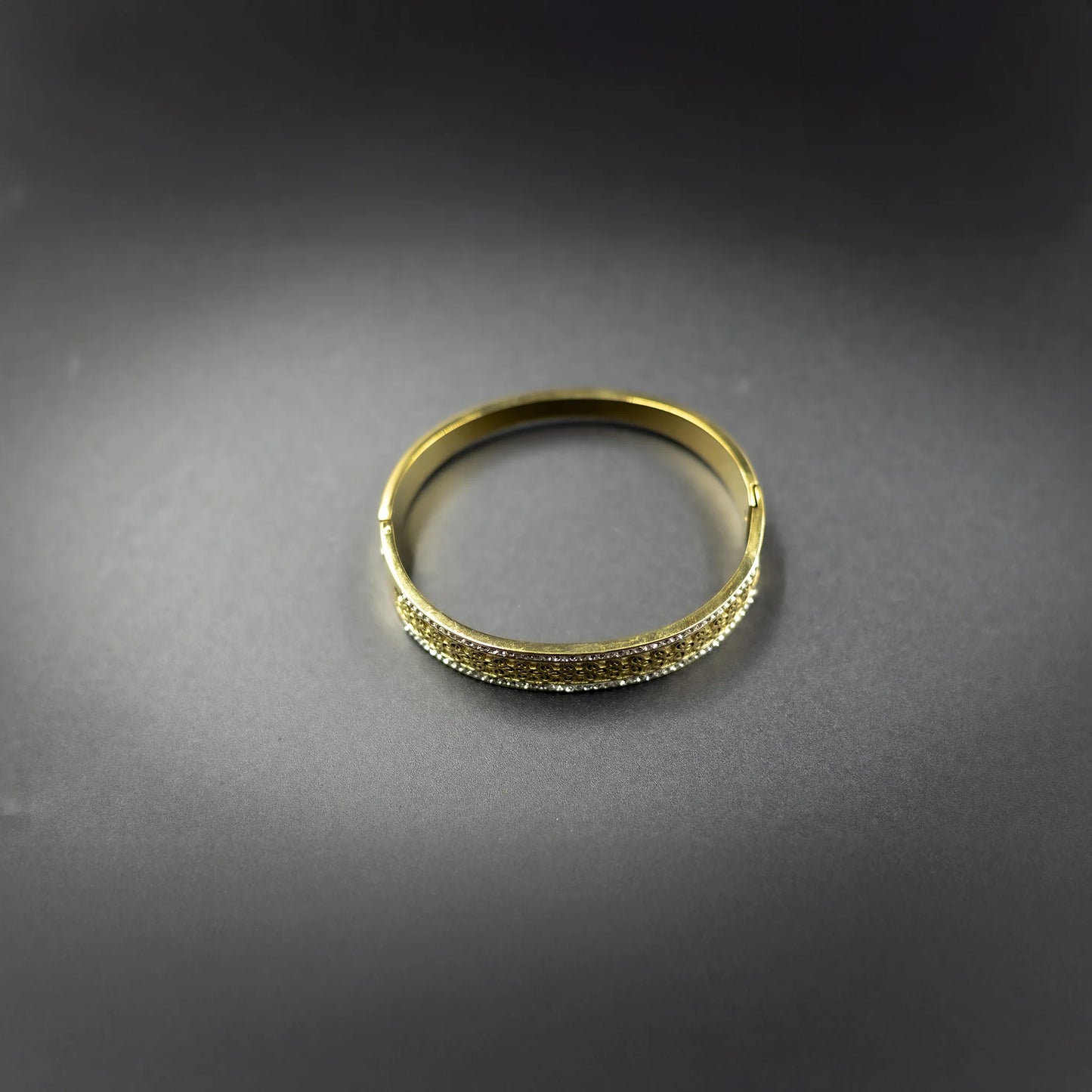 Designer gold finish bracelet for festive wear