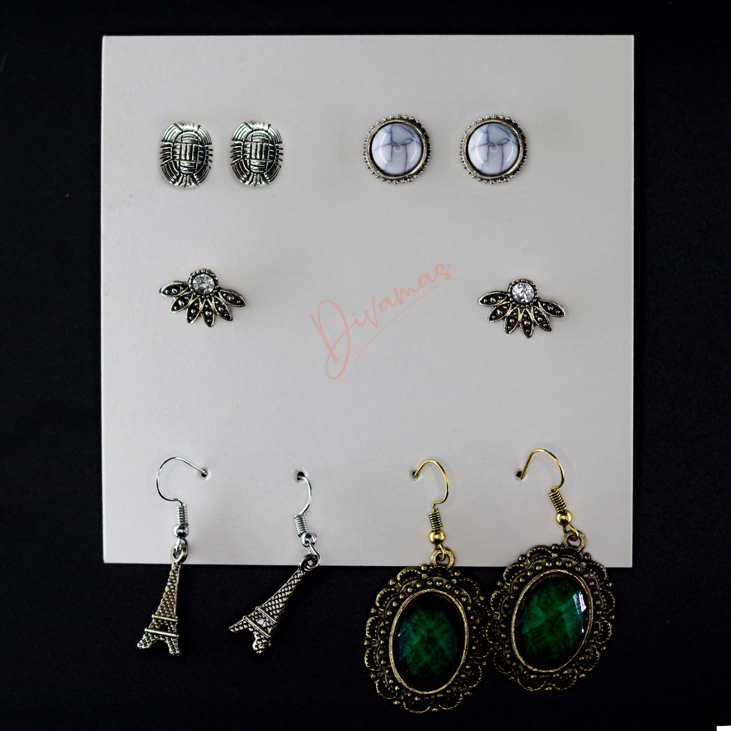Discover DIVAMAS stylish 5-pair earring combo – from trendy hoops to elegant danglers, perfect for any look.