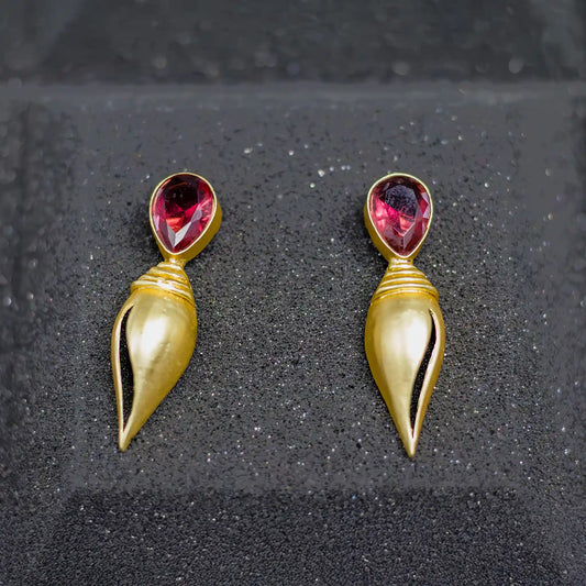 Divamas Gold Plated Shankh Design Earrings with Raw Red Stone