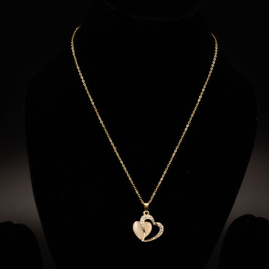 Elegant gold heart pendant necklace featuring a dual-heart design with sparkling crystals and a luminous centerpiece, perfect for special occasions and everyday elegance.