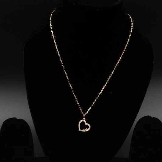 Elegant gold and silver heart pendant necklace featuring an open heart design with sparkling stones and a delicate bow accent, perfect for special occasions and everyday wear.