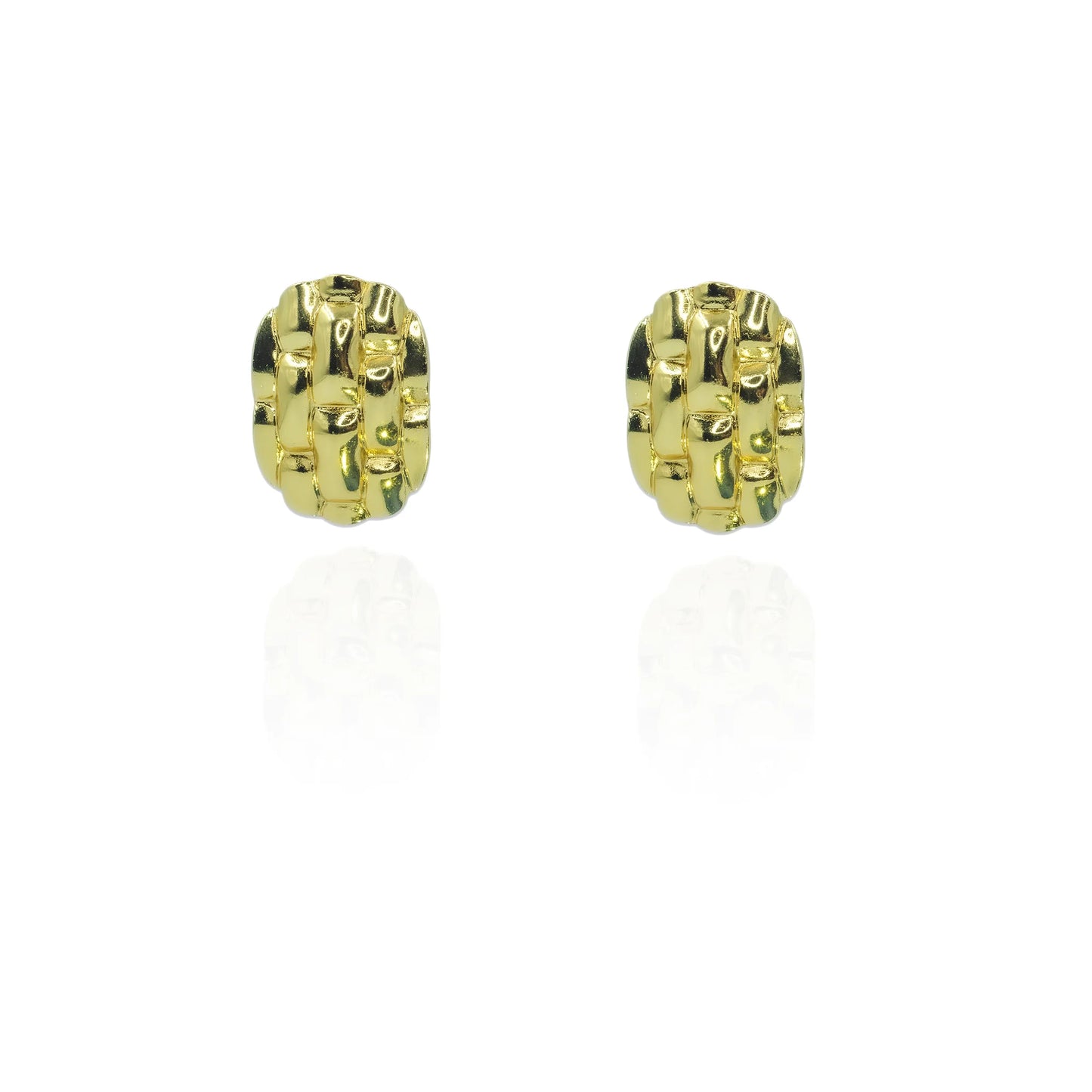 Elegant gold-color designer stud earrings close-up