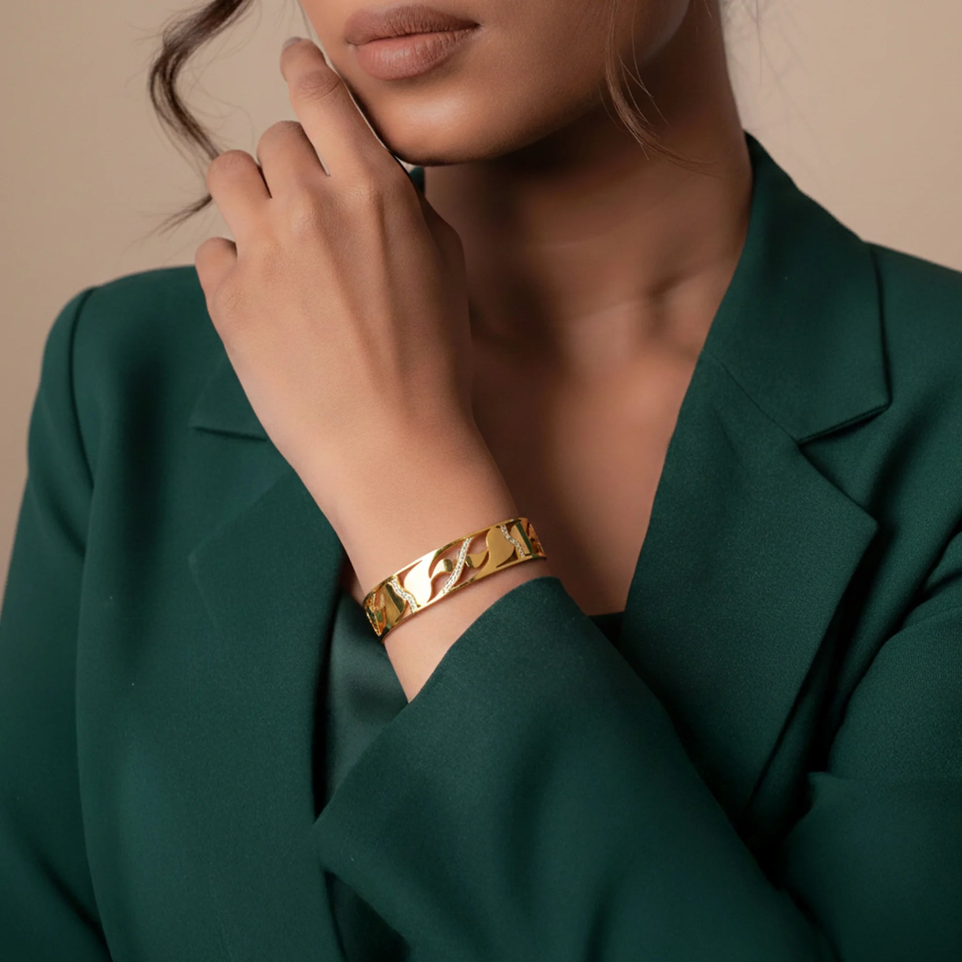 Gold finish wave pattern designer bracelet for women