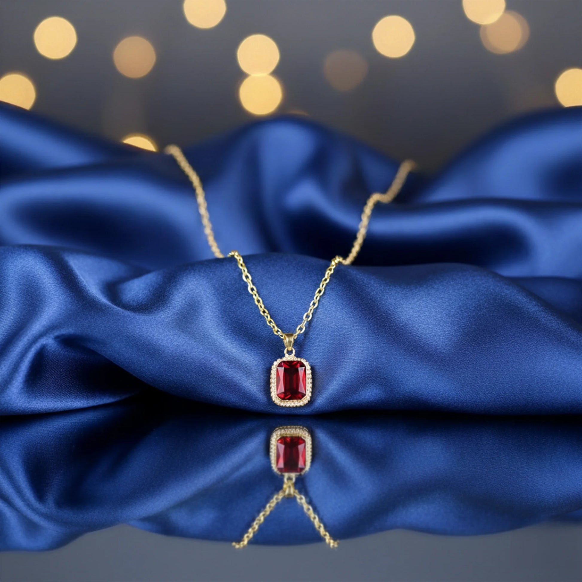 Ruby red stone pendant necklace with gold chain