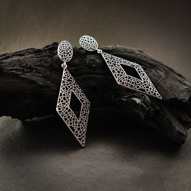 Stylish Silver Alloy Drop Earrings with a sleek and polished silver finish, a lightweight and elegant design, perfect for any occasion.