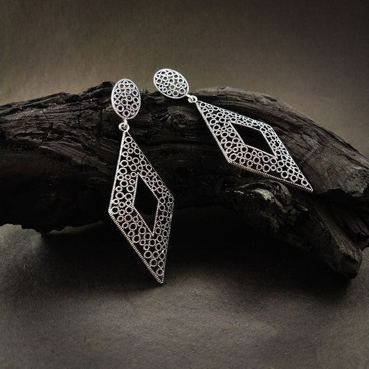 Stylish Silver Alloy Drop Earrings with a sleek and polished silver finish, a lightweight and elegant design, perfect for any occasion.
