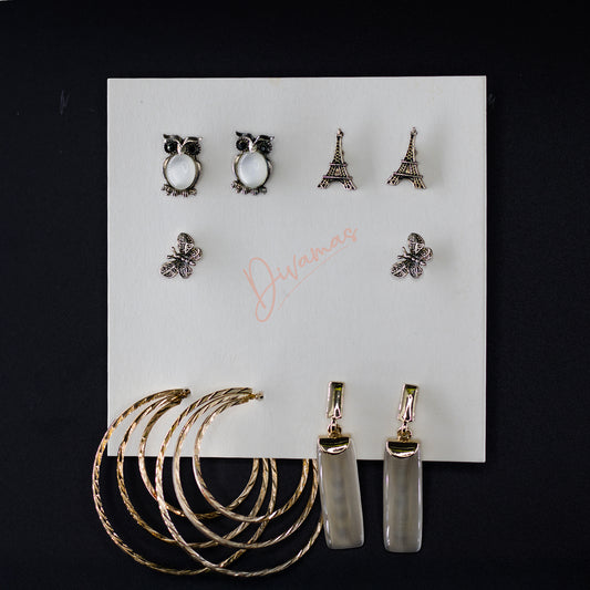  Women’s Earring Combo featuring Owl Set, Eiffel Tower Set, Butterfly Set, Layered Hoop Set, and Crystal Set Divamas